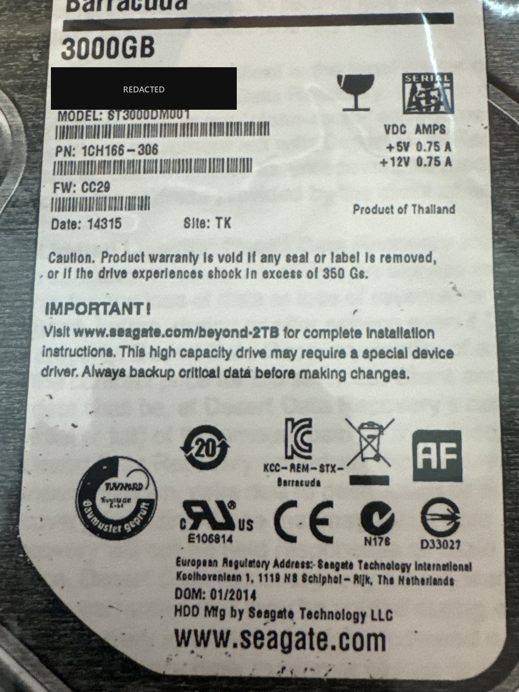 Seagate Barracuda ST3000DM001 3 TB array member drive label with the serial number redacted